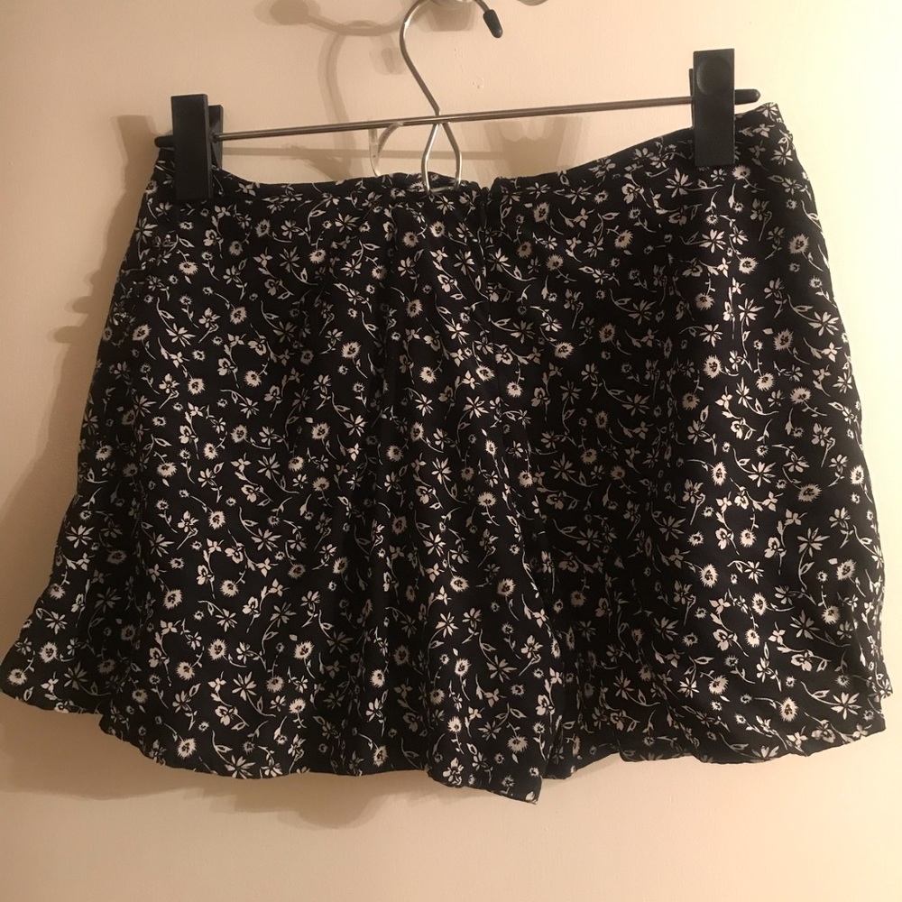 Side button detail short with back zip enclosure